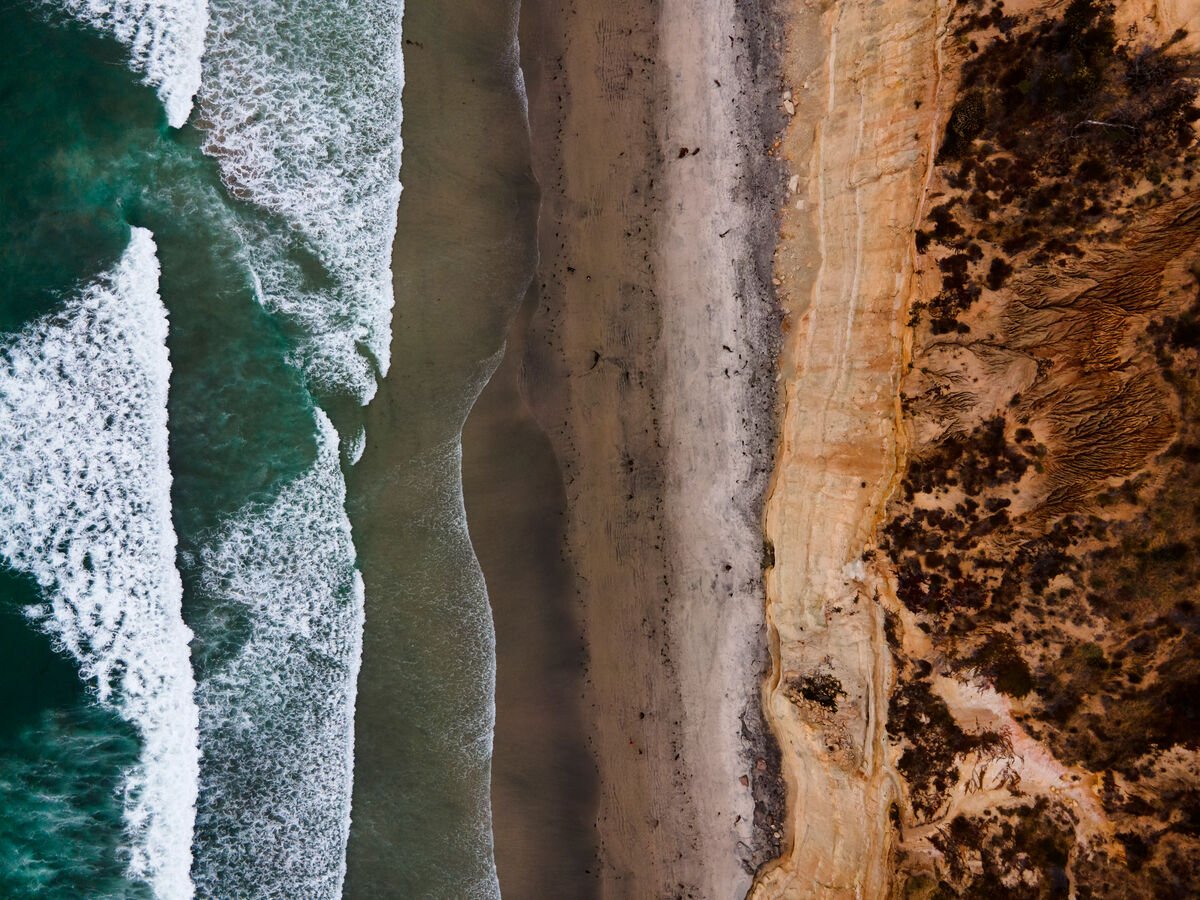 Wave crashing on beach